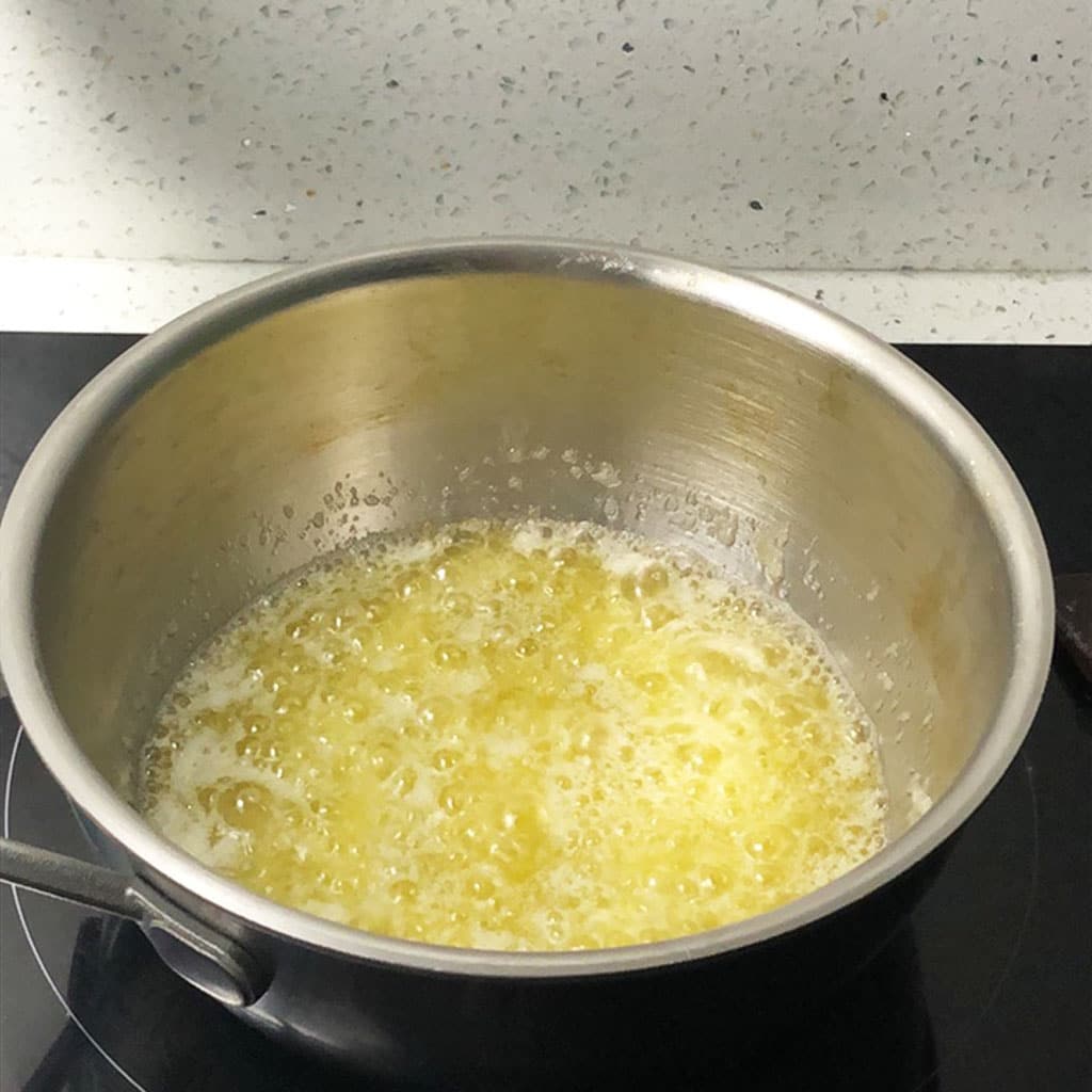 Butter boiling in a saucepan.