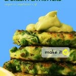 Side view of Zucchini and Green Pea fritters with Avocado Crema on top, agains a bright blue background,