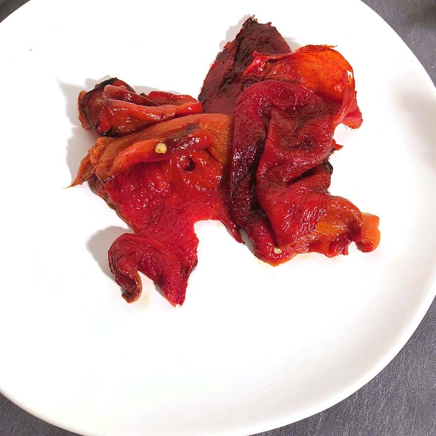 Roasted Red Peppers on a white plate