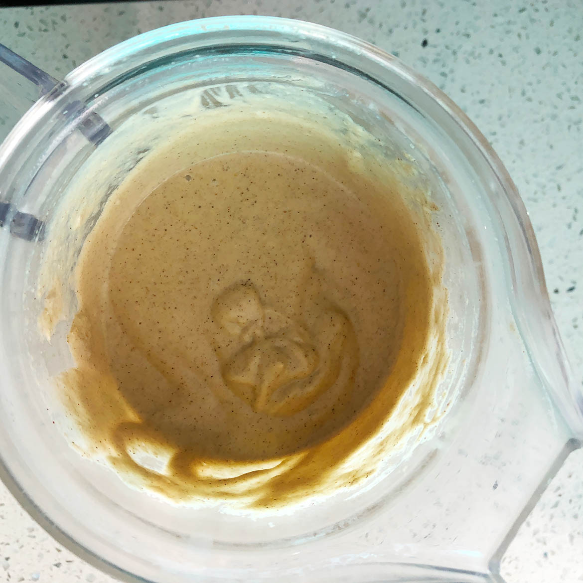 Top-down view of blender with Indian-Inspired Cashew Sauce. 