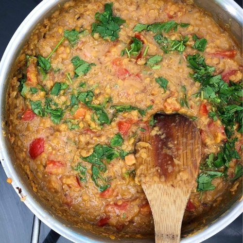Stir the fresh cilantro into the cooked red lentils