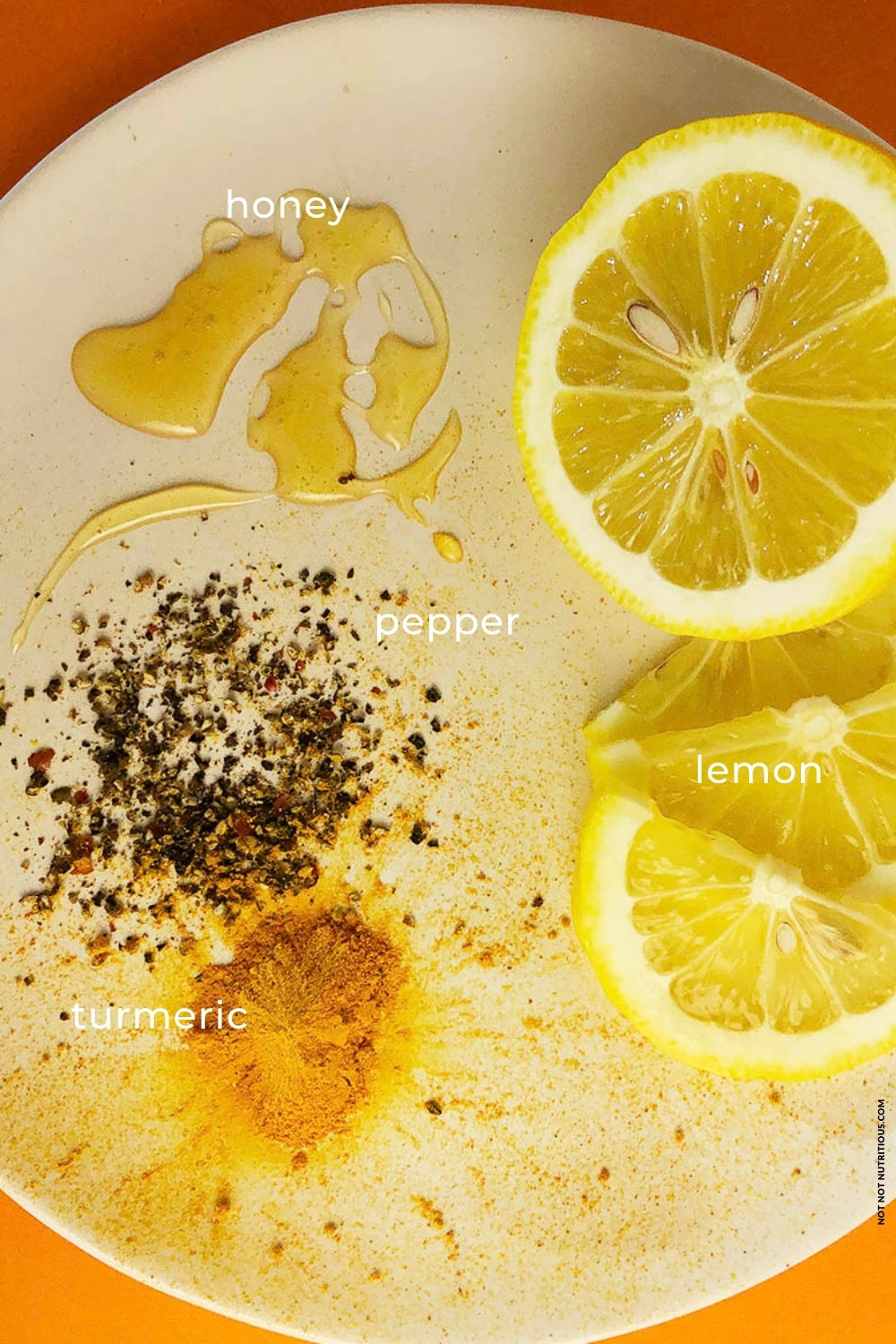 Ingredients for Hot Lemonade - honey, lemons, turmeric, and black pepper