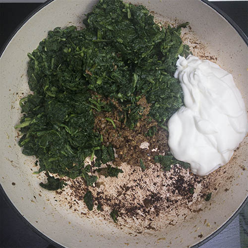 Add the yogurt and spinach to the fried spices. Stir and heat through.