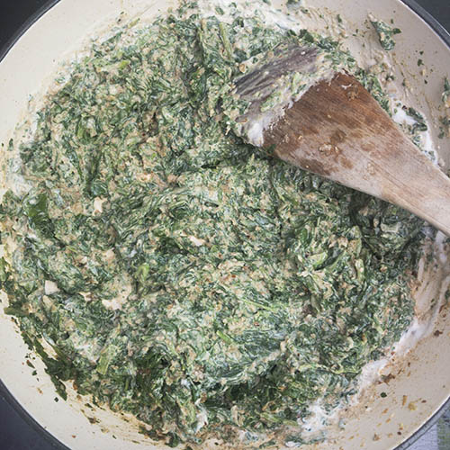 Stir in the yogurt and spinach and heat through. 
