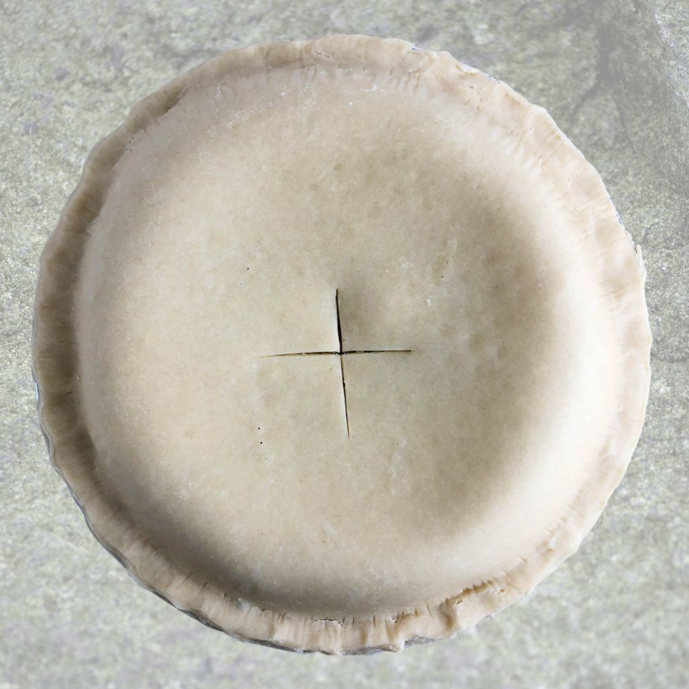 Top-down view of top of pie, with cuts in the crust.