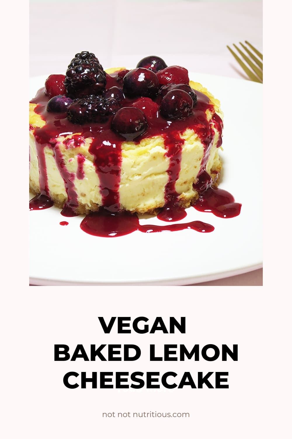 Pinterest Pin for Vegan Baked Lemon Cheesecake, with cheesecake topped with Triple Berry Sauce on a white plate