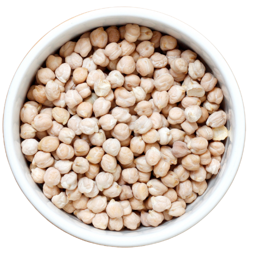 Top down view of uncooked chickpeas, also known as garbanzo beans, in a white bowl