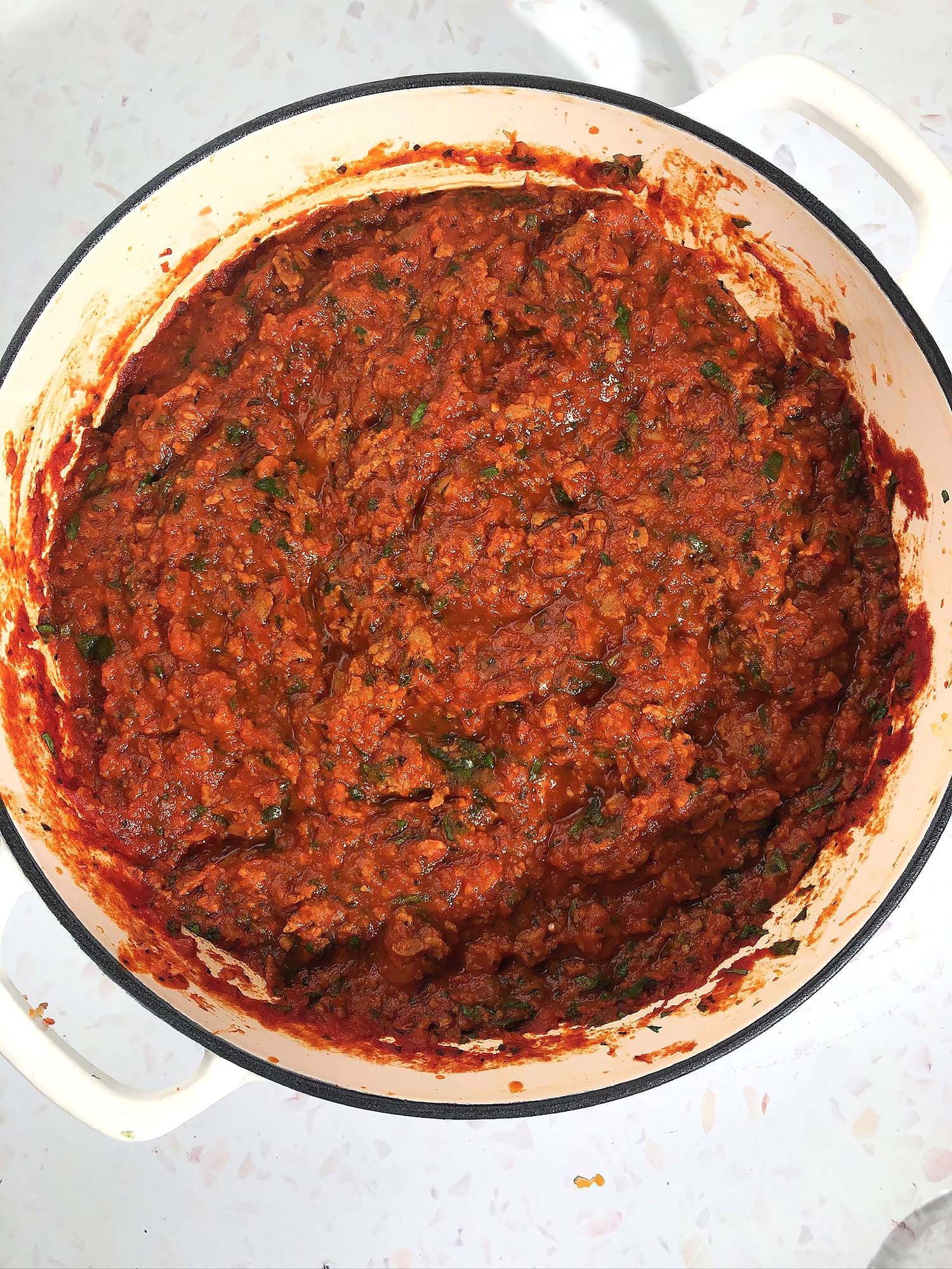 Top-down view of Beyond Meat Spaghetti Sauce in white pot
