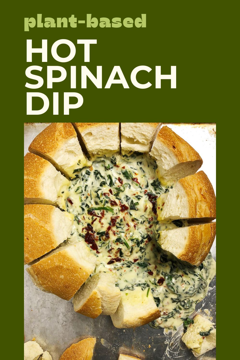 Pin for Hot Spinach Dip. Top-down view of Hot Spinach dip in a bread bowl, with dip ooozing out of the bowl, and bread chunks ready for dipping. Dip is gluten-free without the bread bowl
