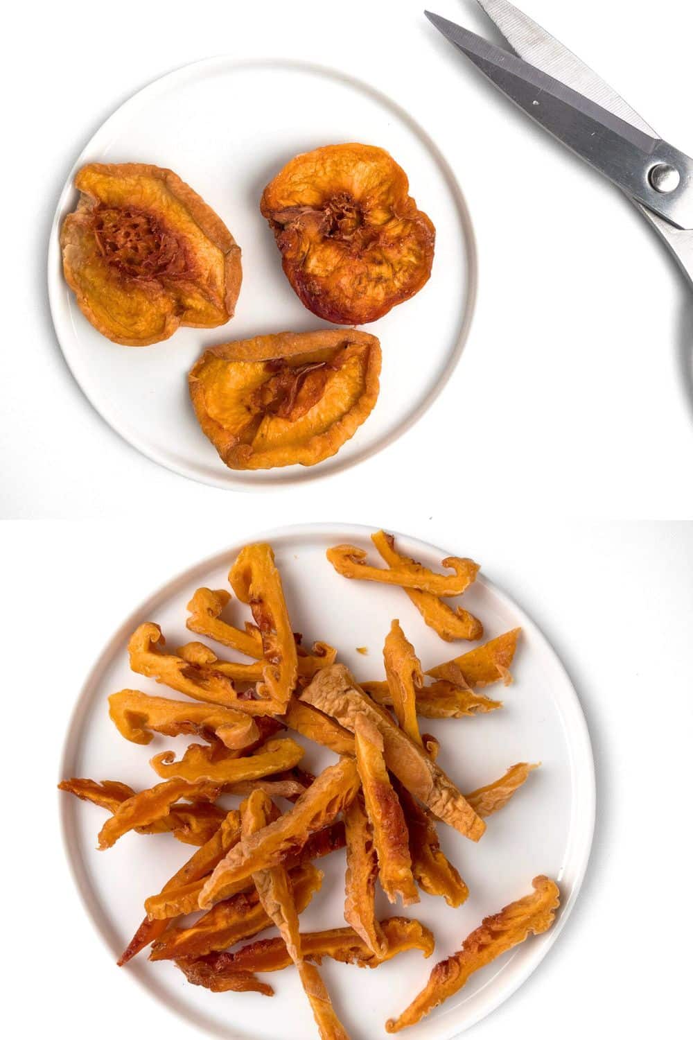 Top down view of three dried peaches on a white plate, next to some scissors, with a second plate with dried peaches cut into strips