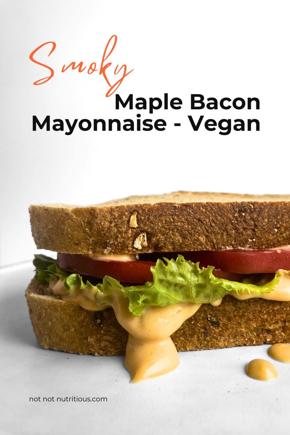 Serving suggestion for Smoky Maple Bacon Mayonnaise - a tomato, lettuce, and mayo sandwich.
